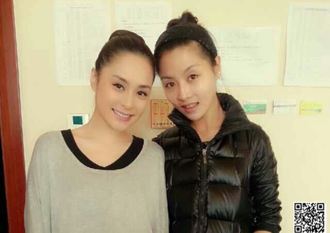 小松老师与钟欣桐合影